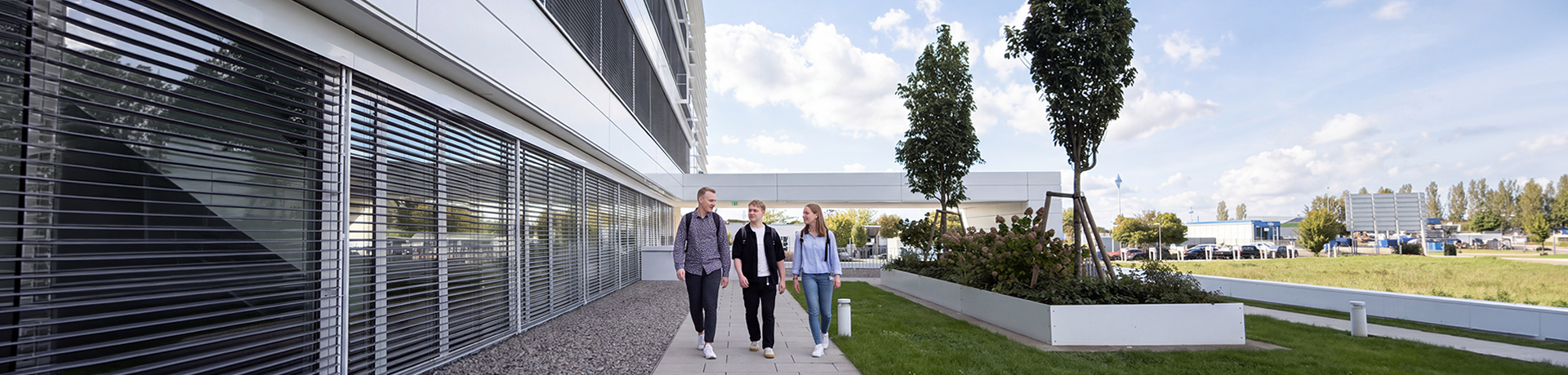 Real Garant employees in front of the building